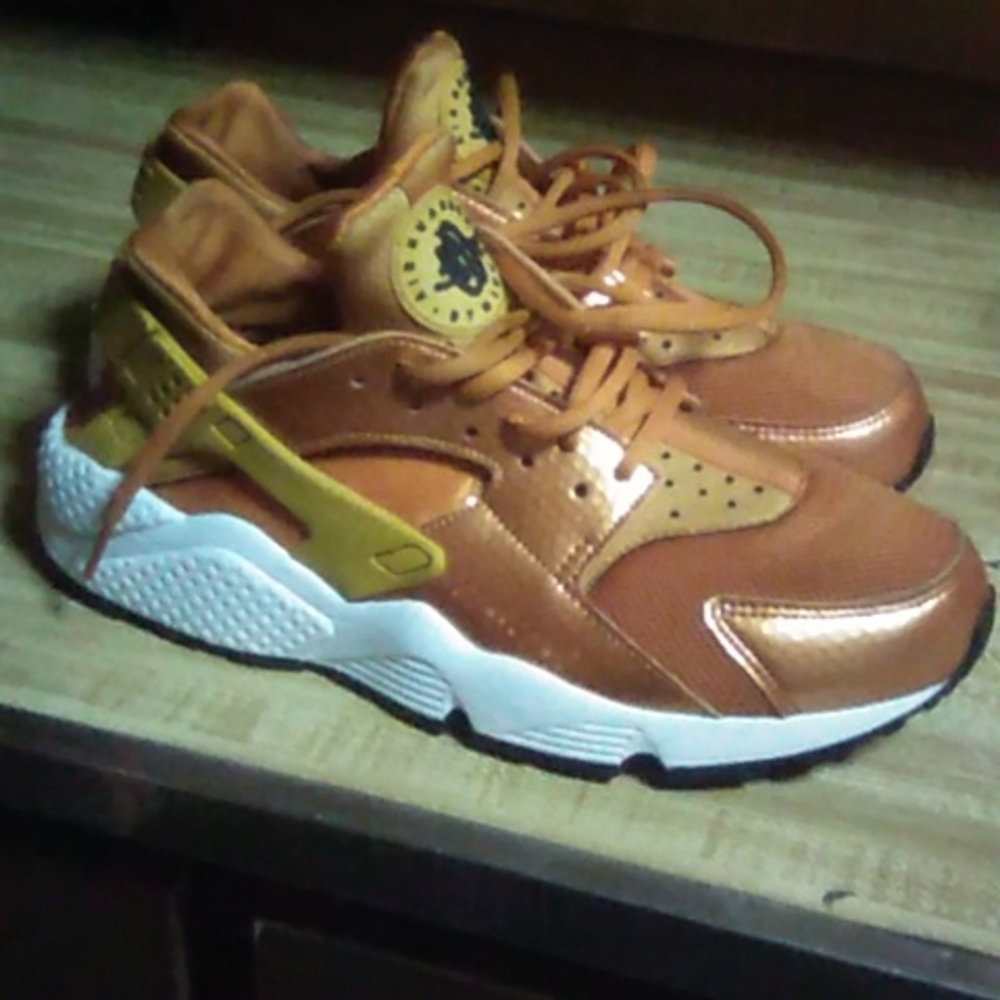 Orange/orange metallic/white Nike huaraches